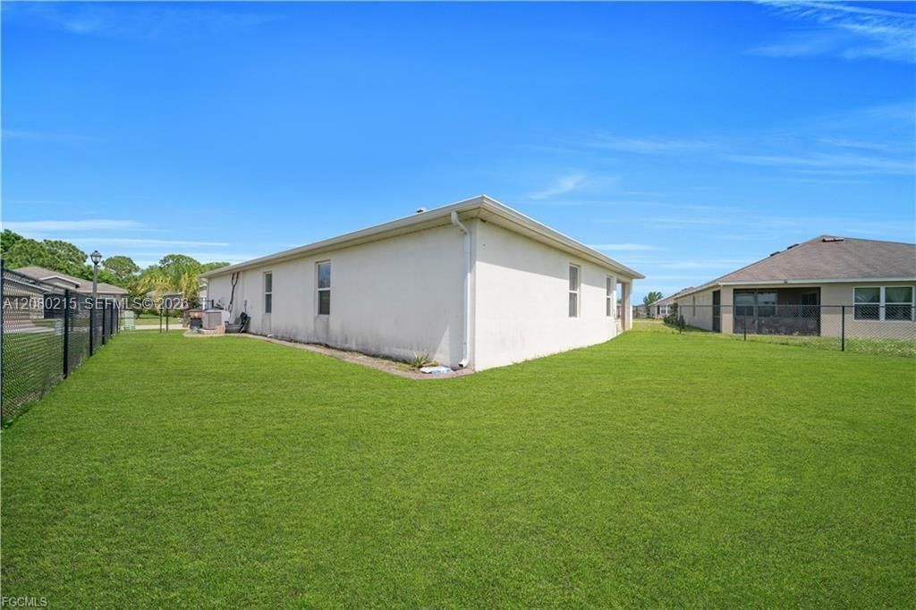 10549 Canal Brook Ln , Lehigh Acres, FL 33936 Photo