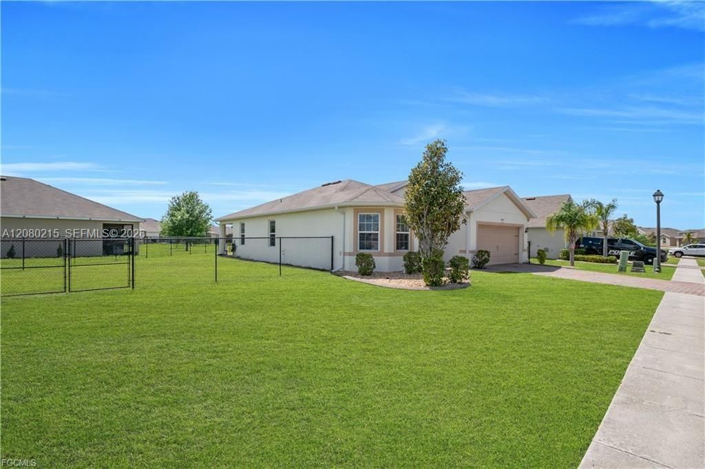 10549 Canal Brook Ln , Lehigh Acres, FL 33936 Photo