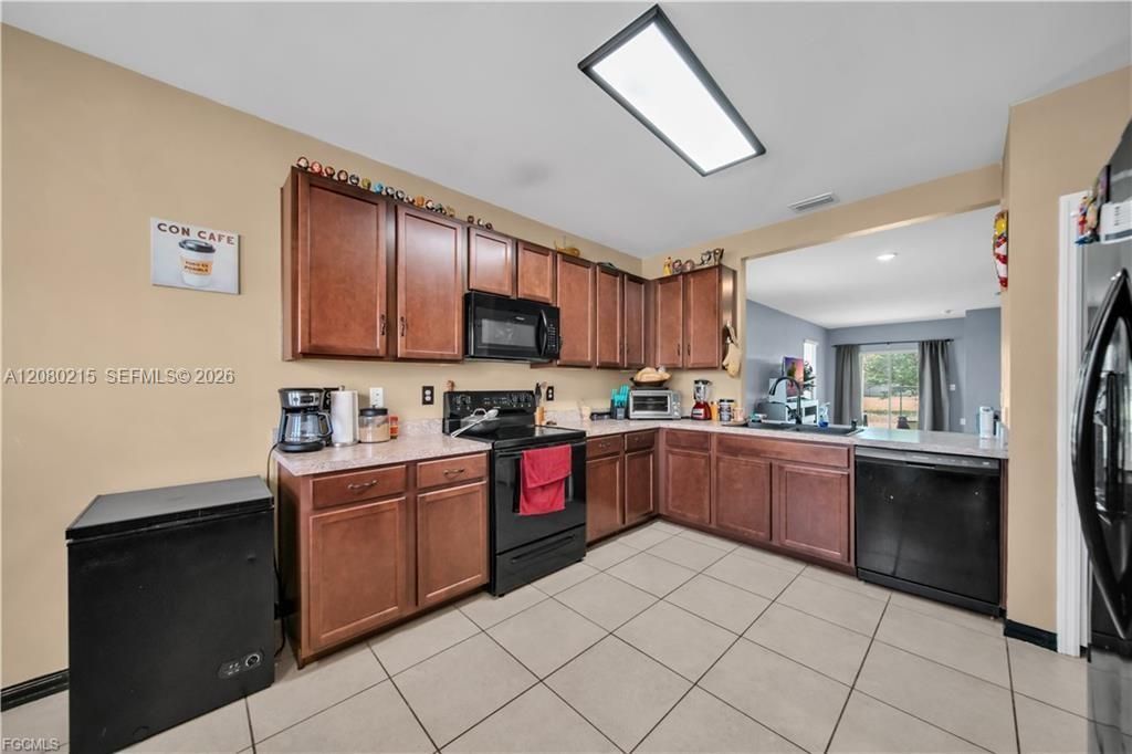 10549 Canal Brook Ln , Lehigh Acres, FL 33936 Photo