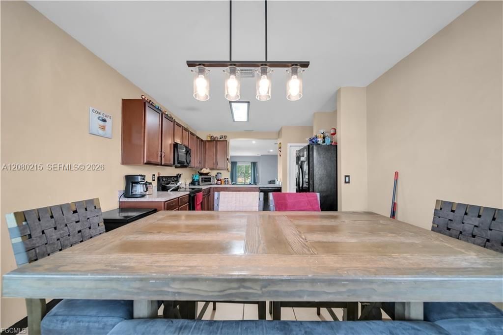 10549 Canal Brook Ln , Lehigh Acres, FL 33936 Photo