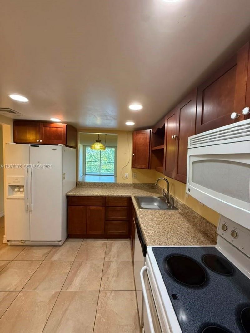 3261 Holiday Springs Blvd , Unit 401, Margate, FL 33063 Photo