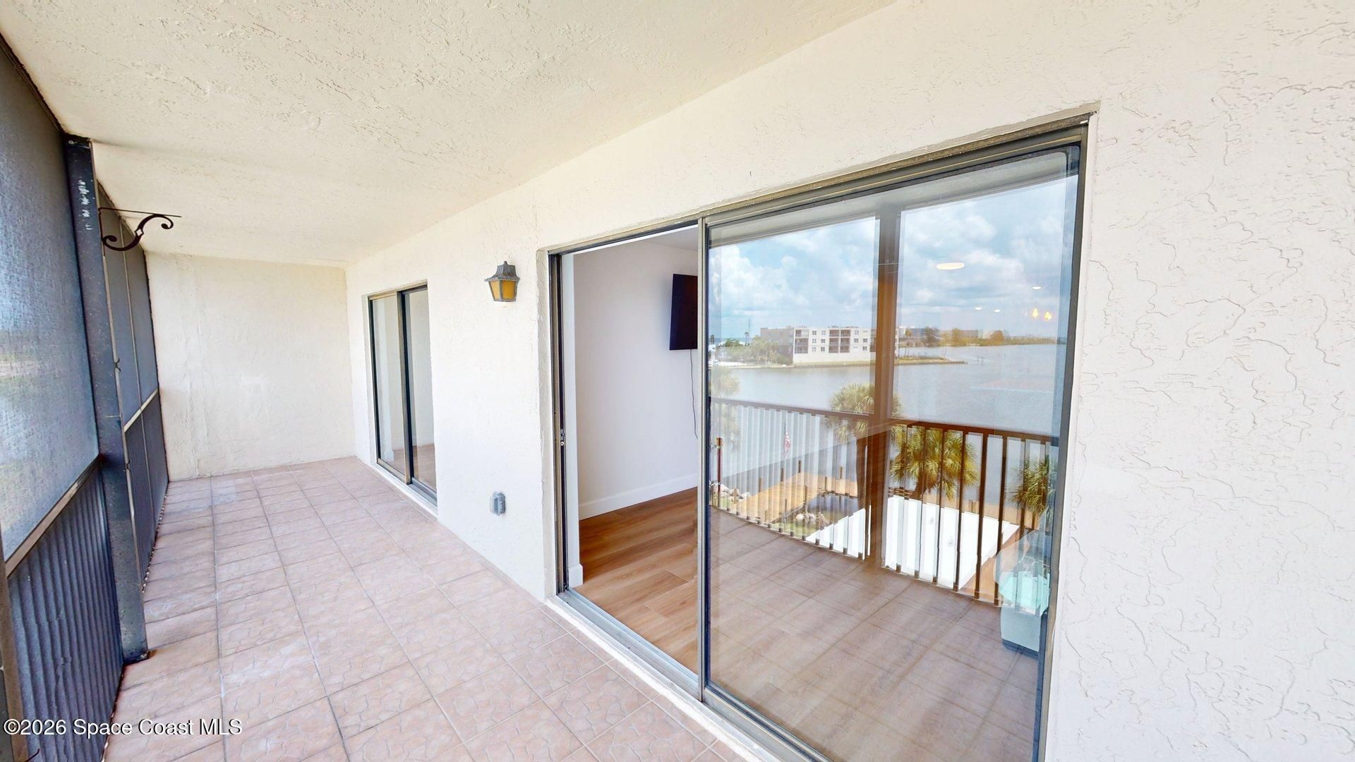 3833 S Banana River Boulevard , Unit 403, Cocoa Beach, FL 32931 Photo