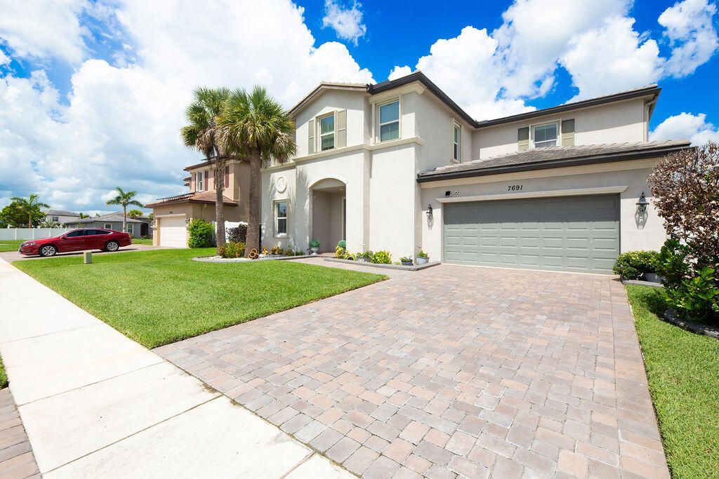 7691 NW Greenspring Street, Port Saint Lucie, FL 34987 Photo