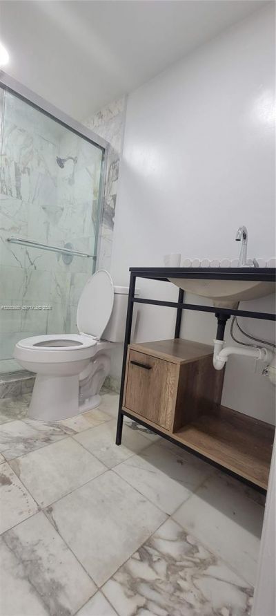 455 Golden Isles Dr , Unit 310, Hallandale Beach, FL 33009 Photo
