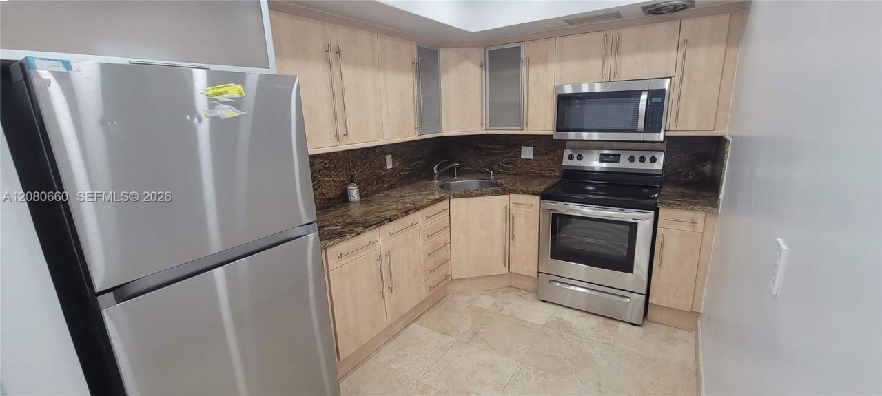 455 Golden Isles Dr , Unit 310, Hallandale Beach, FL 33009 Photo