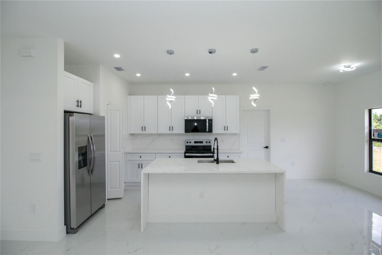 945 Commodore Street, Lehigh Acres, FL 33974 Photo