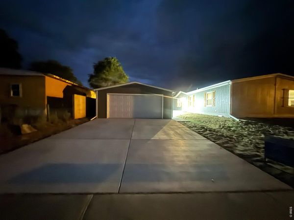 103 Beach Dr, Log Lane Village, CO 80705
