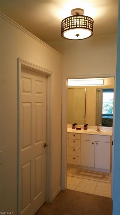 445 Robin Hood Cir , Unit 201, Naples, FL 34104 Photo
