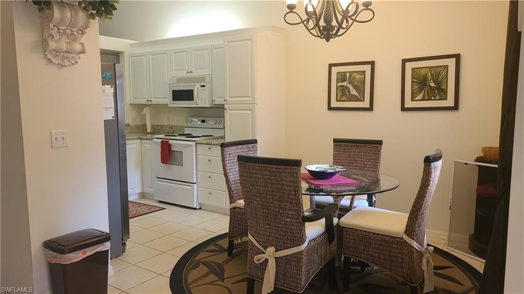 445 Robin Hood Cir , Unit 201, Naples, FL 34104 Photo