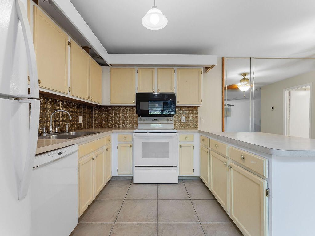 6431 SE Windsong Lane, Unit 117, Stuart, FL 34997 Photo