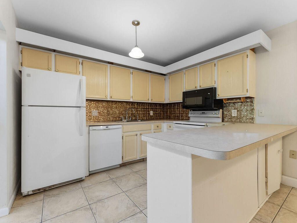 6431 SE Windsong Lane, Unit 117, Stuart, FL 34997 Photo