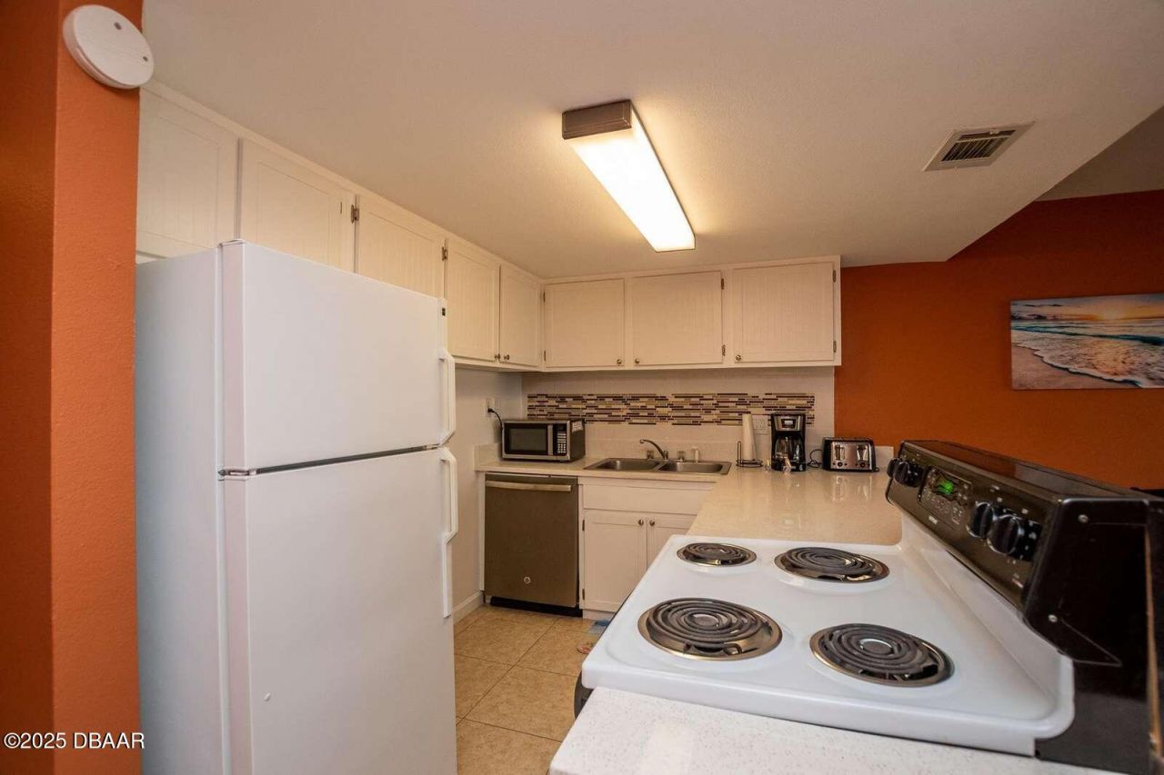 4849 Saxon Drive, Unit C202, New Smyrna Beach, FL 32169 Photo