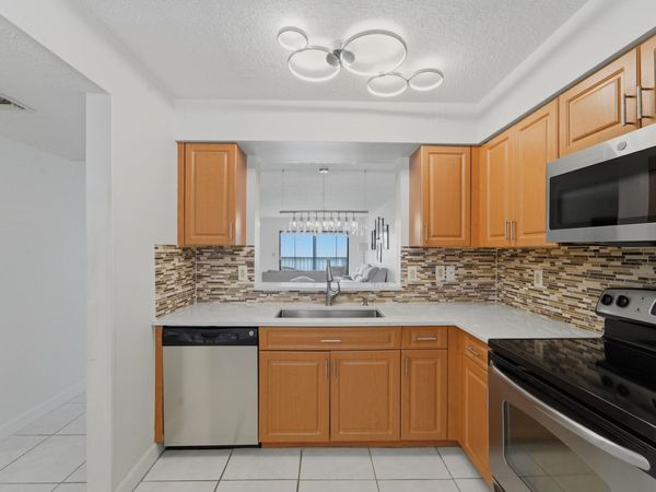 6093 POINTE REGAL Circle, Unit 209, Delray Beach, FL 33484