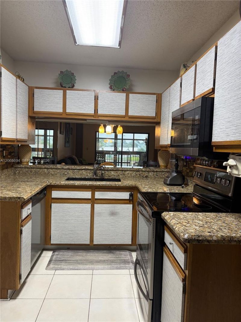 9830 W Mcnab Rd , Unit 208, Tamarac, FL 33321 Photo