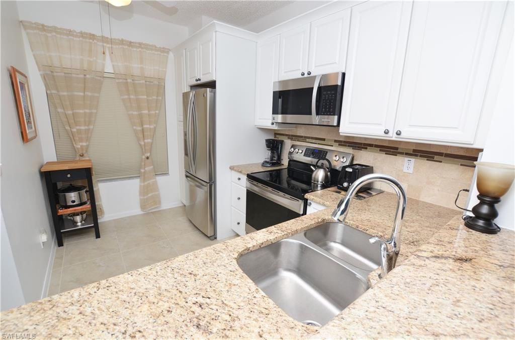 1044 Woodshire Ln, Unit B210, Naples, FL 34105 Photo
