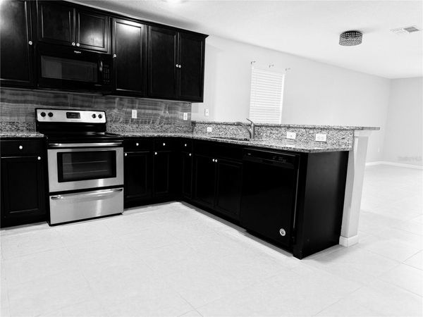 8690 LAKE GEORGE CIRCLE E, MACCLENNY, FL 32063