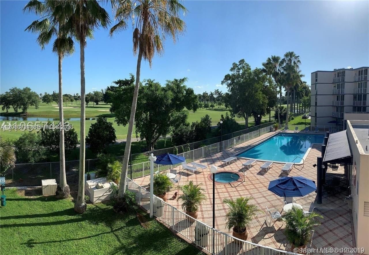 6955 NW 186th St , Unit F205, Hialeah, FL 33015 Photo