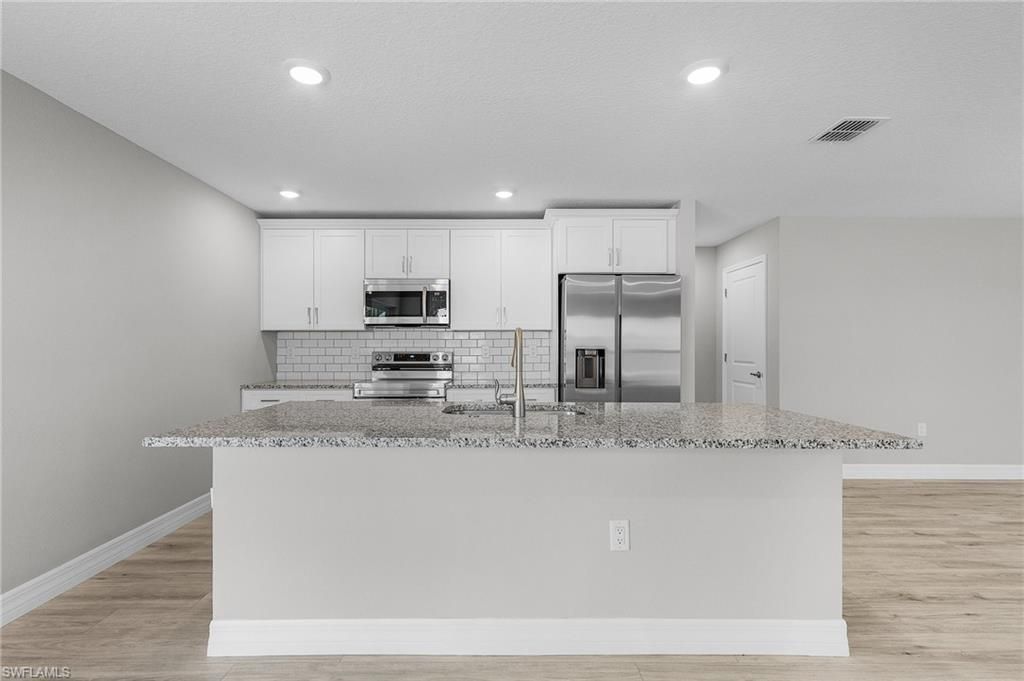 337 Woodburn Dr , Lehigh Acres, FL 33972 Photo