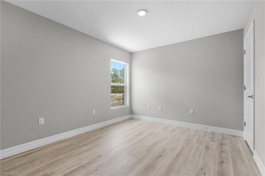 337 Woodburn Dr , Lehigh Acres, FL 33972 Photo