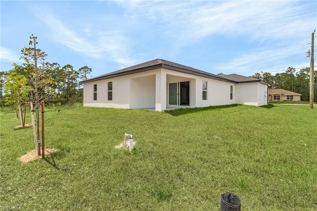 337 Woodburn Dr , Lehigh Acres, FL 33972 Photo