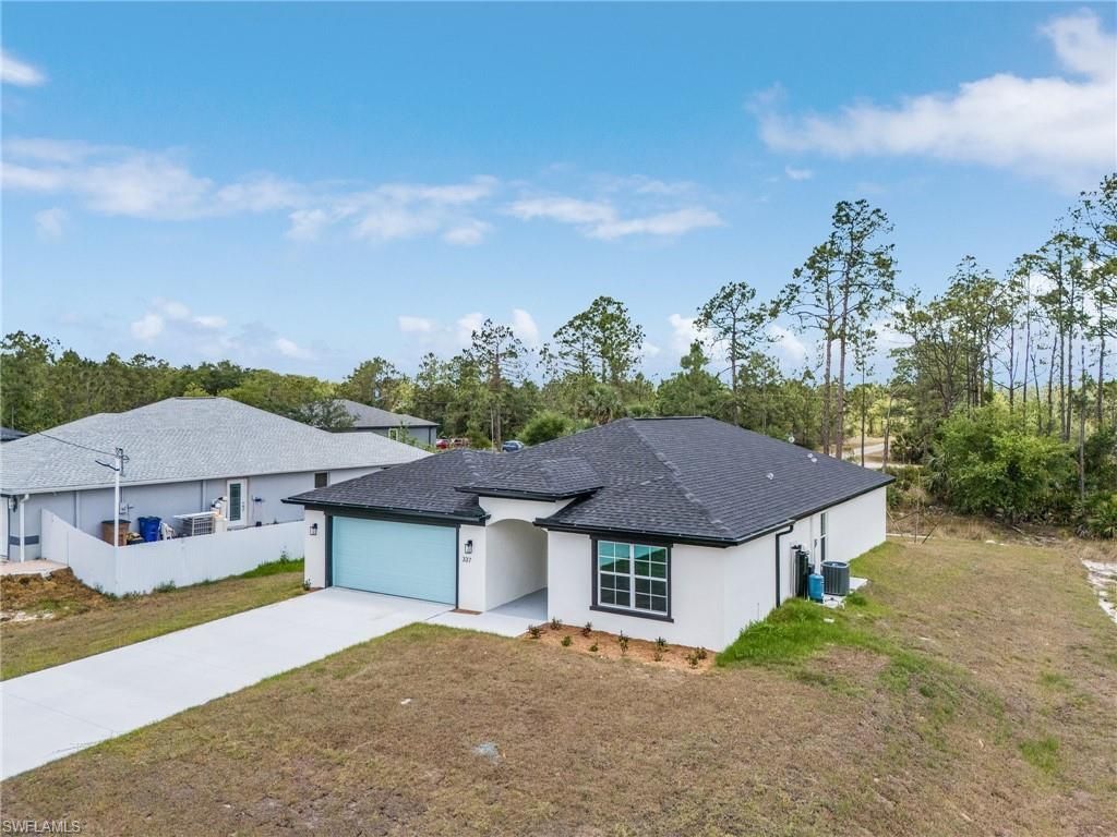 337 Woodburn Dr , Lehigh Acres, FL 33972 Photo