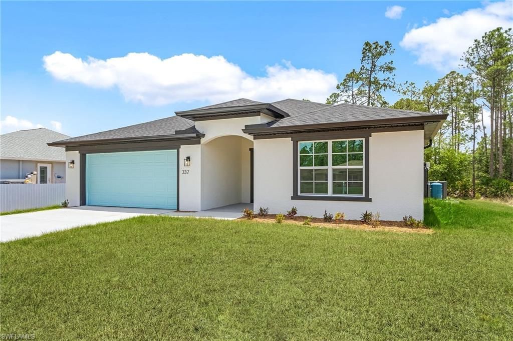 337 Woodburn Dr , Lehigh Acres, FL 33972 Photo