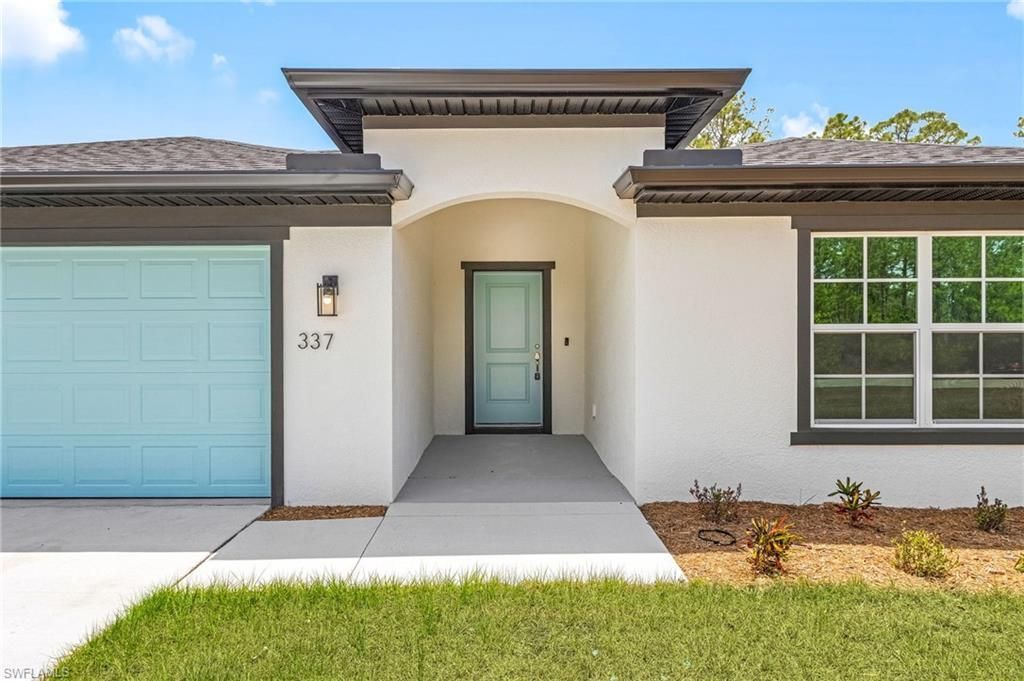 337 Woodburn Dr , Lehigh Acres, FL 33972 Photo