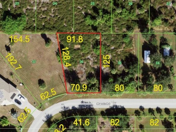 6977 MANNIZ ROAD , PORT CHARLOTTE, FL 33981