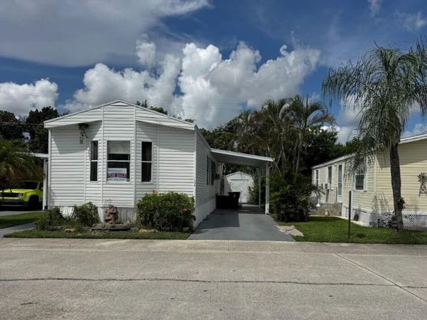 104 Plantation Boulevard, Unit 104, Greenacres, FL 33467