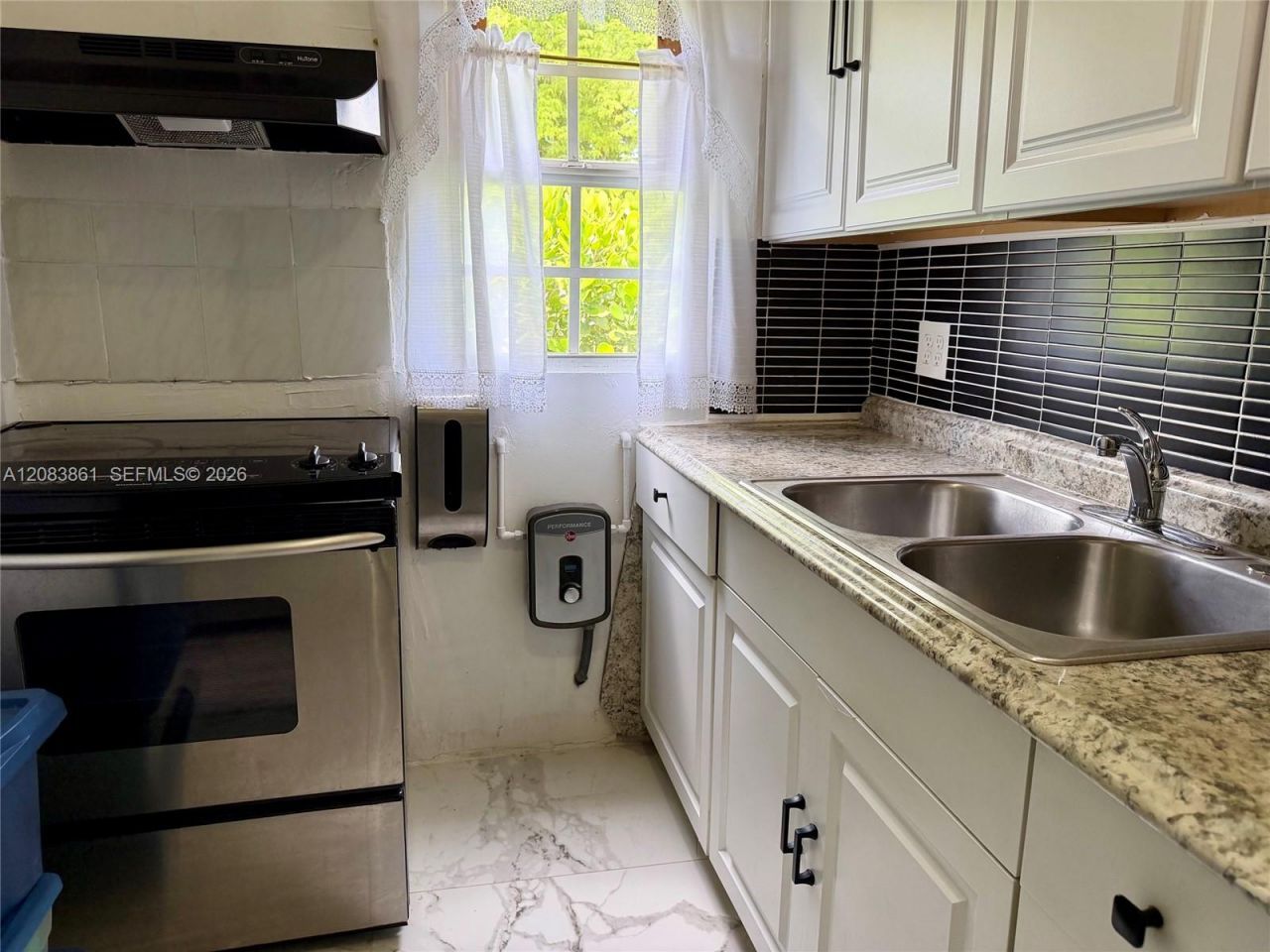 2440 NW 57th St , Miami, FL 33142 Photo