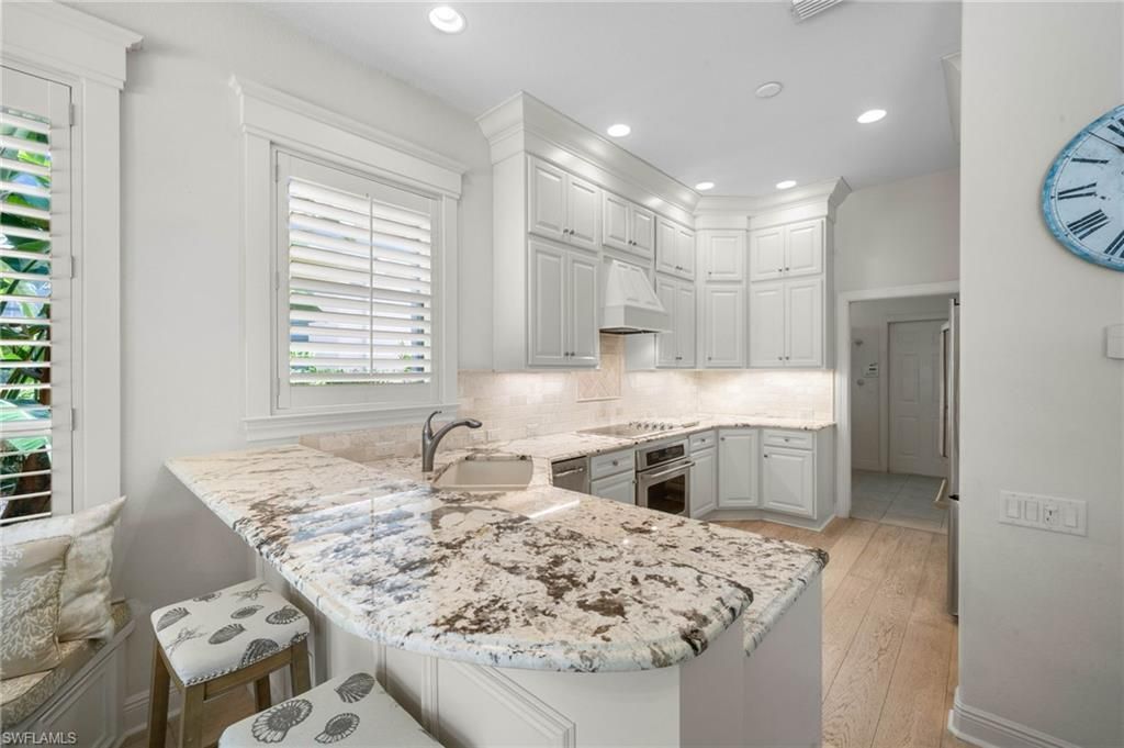 9296 Troon Lakes Dr, Naples, FL 34109 Photo