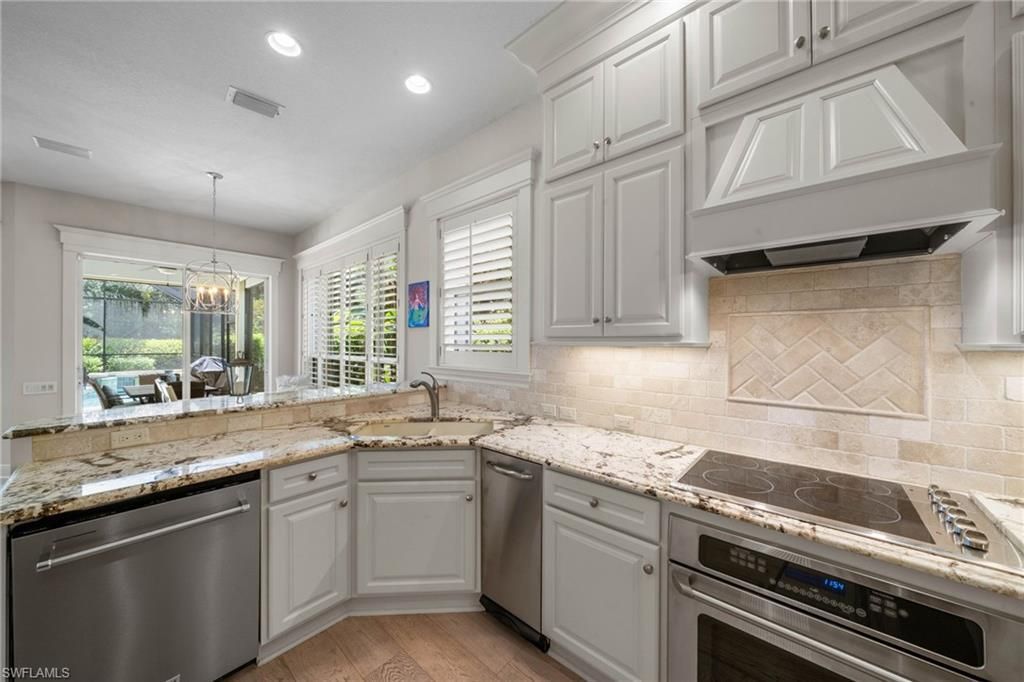 9296 Troon Lakes Dr, Naples, FL 34109 Photo