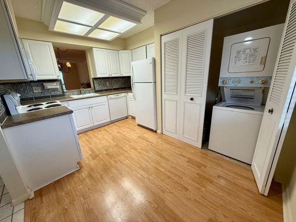 2212 S CYPRESS BEND Drive, Unit 303, Pompano Beach, FL 33069