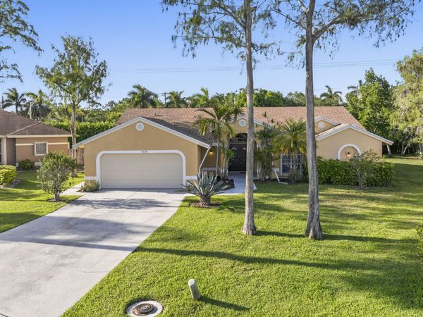 104 Oxford Court, Royal Palm Beach, FL 33411