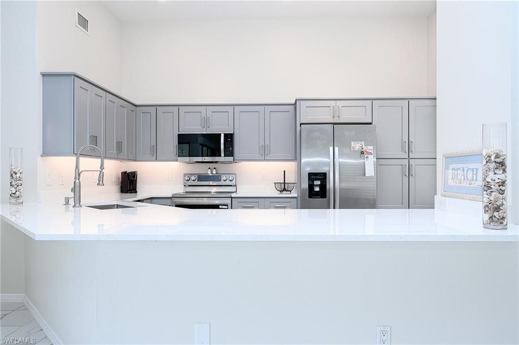 661 Windsurf Ln , Unit A-202, Naples, FL 34108 Photo