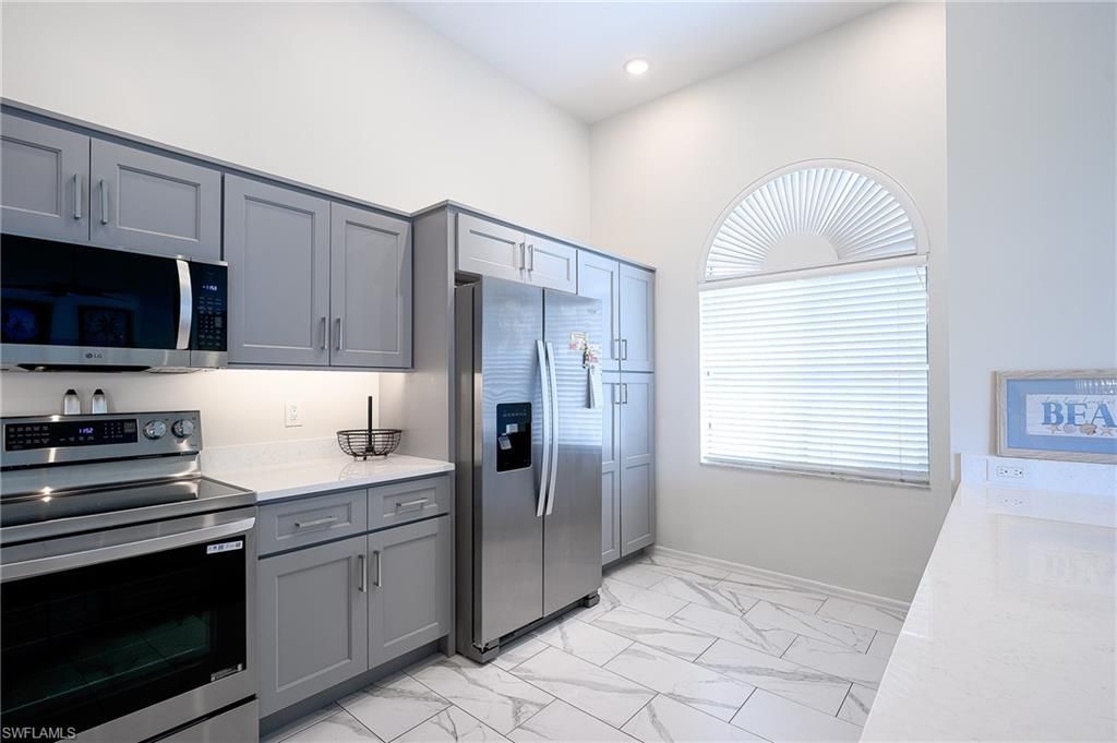 661 Windsurf Ln , Unit A-202, Naples, FL 34108 Photo