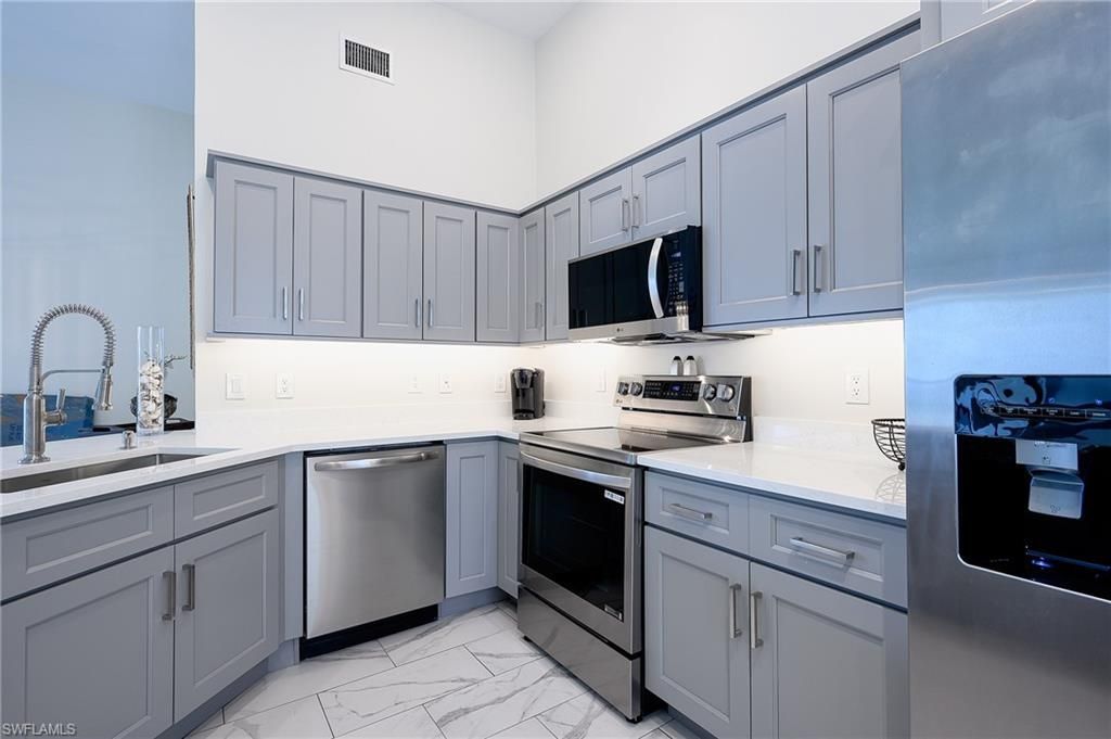 661 Windsurf Ln , Unit A-202, Naples, FL 34108 Photo