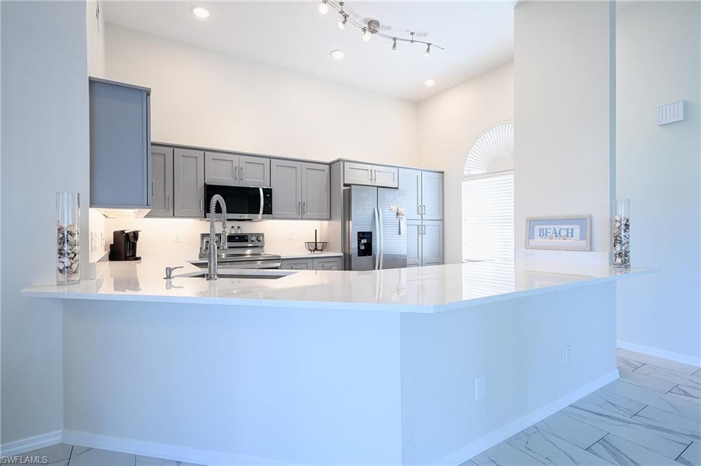 661 Windsurf Ln , Unit A-202, Naples, FL 34108 Photo