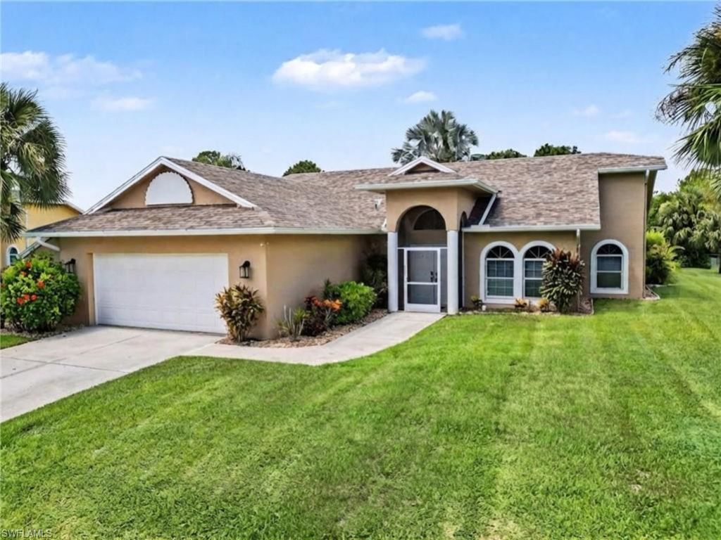 405 Poinsettia Ave , Lehigh Acres, FL 33972 Photo