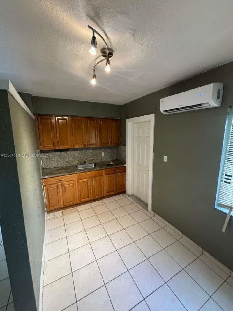 1167 NW 112th St , Unit A, Miami, FL 33168 Photo