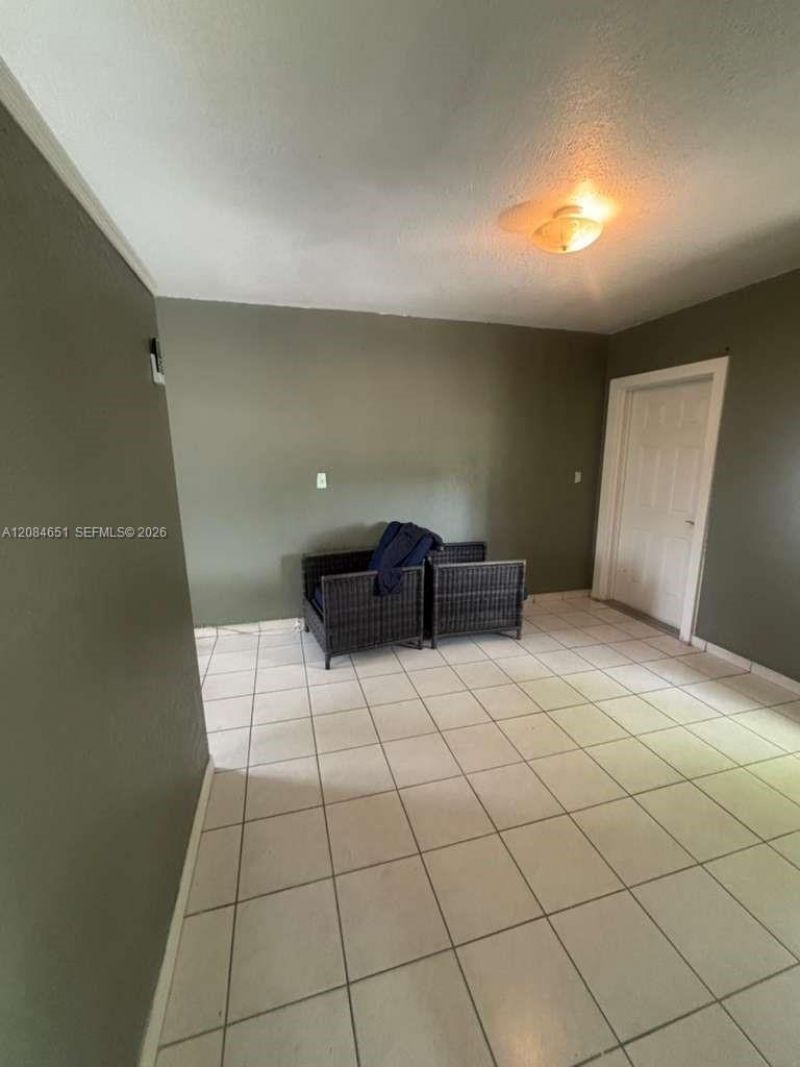 1167 NW 112th St , Unit A, Miami, FL 33168 Photo