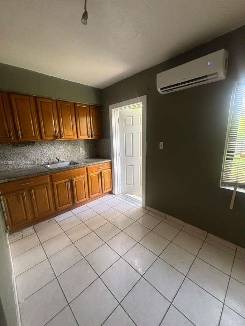 1167 NW 112th St , Unit A, Miami, FL 33168 Photo