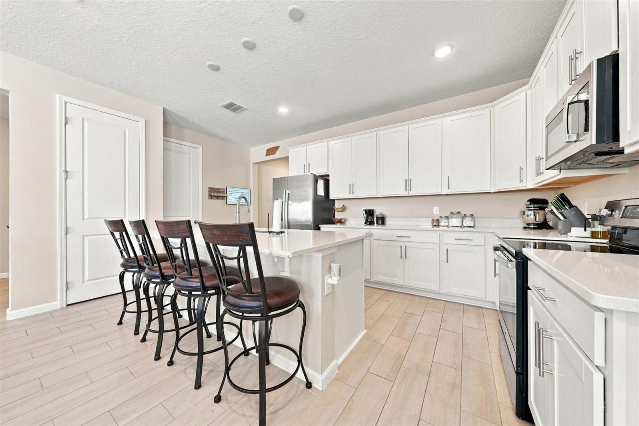 1530 Sugarbelle Circle, Mascotte, FL 34753 Photo