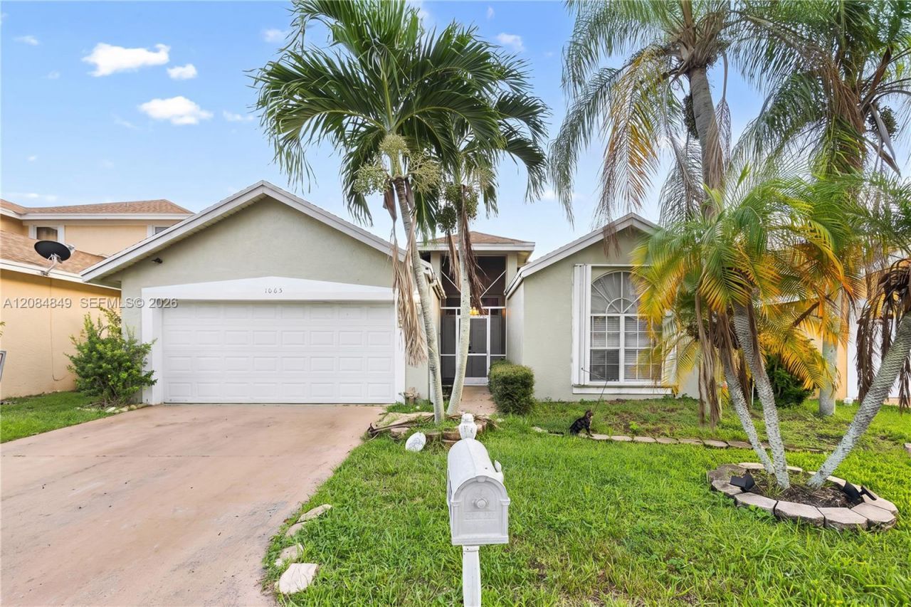 1065 W Fairfax Cir W, Boynton Beach, FL 33436 Main Photo