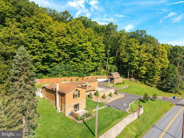 5869 MILLIGANS COVE ROAD , MANNS CHOICE, PA 15550