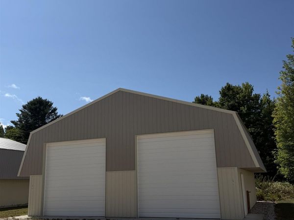 6912 Clipper Ave, Kewadin, MI 49648