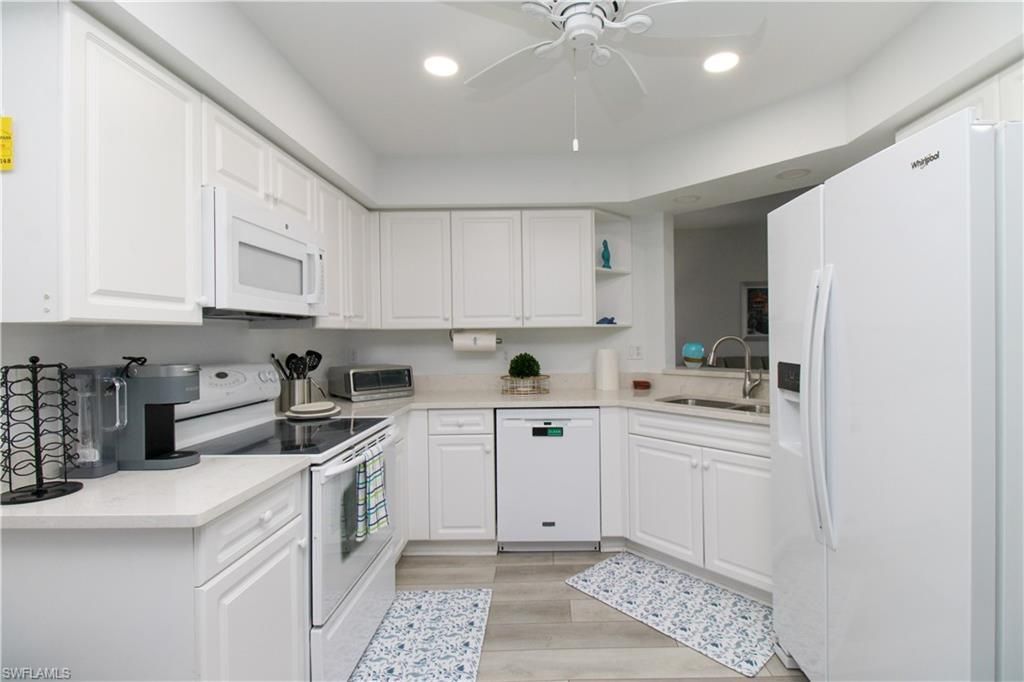 25080 Peacock Ln, Unit 101, Naples, FL 34114 Photo