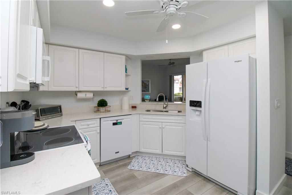 25080 Peacock Ln, Unit 101, Naples, FL 34114 Photo