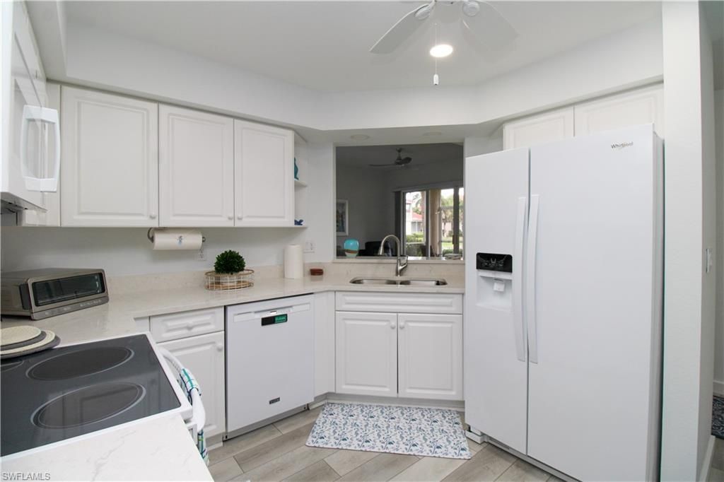 25080 Peacock Ln, Unit 101, Naples, FL 34114 Photo