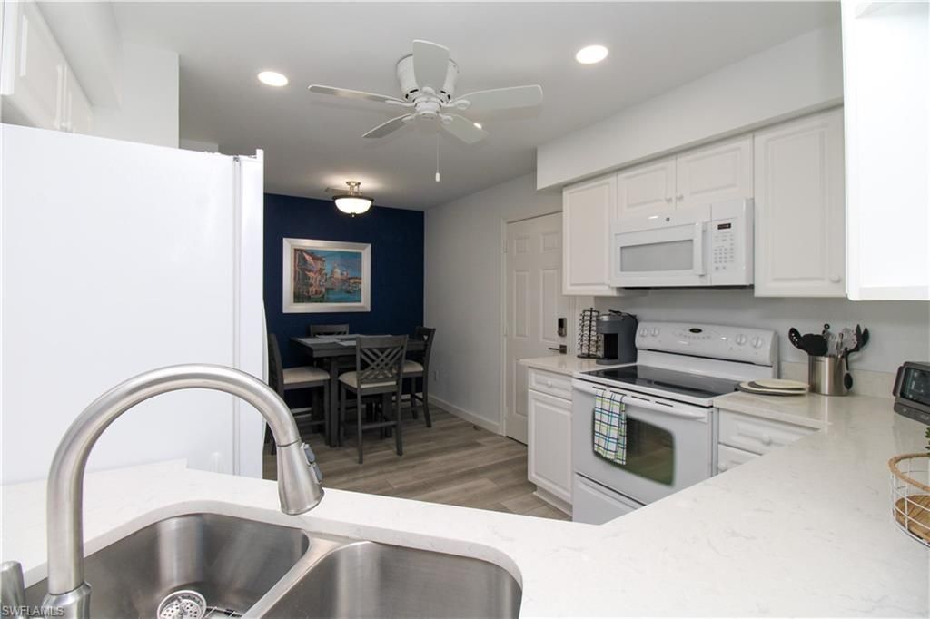 25080 Peacock Ln, Unit 101, Naples, FL 34114 Photo